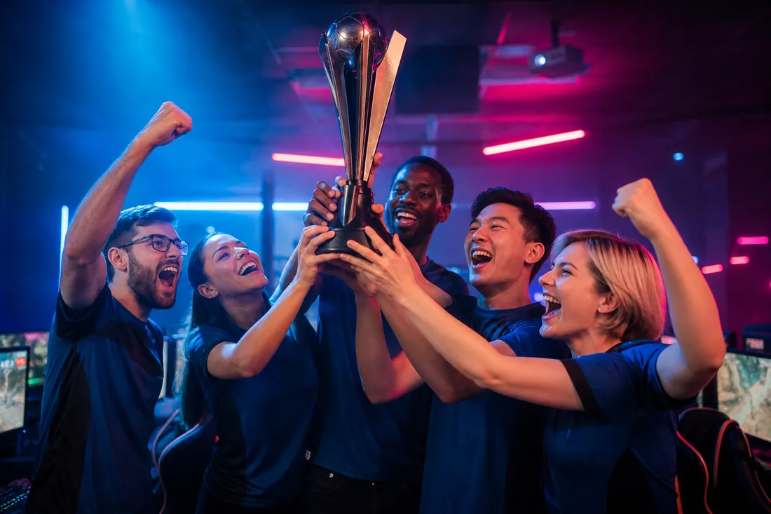 Esports team celebrating a championship